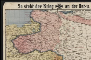 Eine gerahmte Deutschlandkarte mit der Aufschrift "So Steht der Krieg an der Ost-U" darauf.