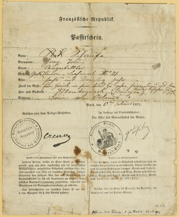 Gelbliches Schreiben der deutschen Regierung mit einem kreisförmigen, schwarz umrandeten Stempel und schwarzer Tintenschrift.